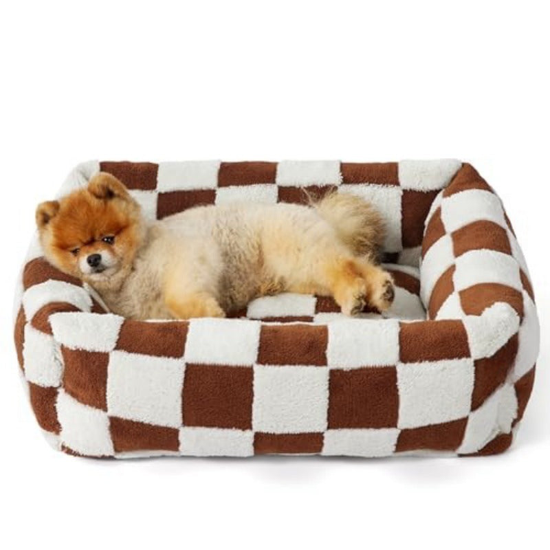 Brown and cream checkered pet bed with raised sides and a small dog; supplier design example