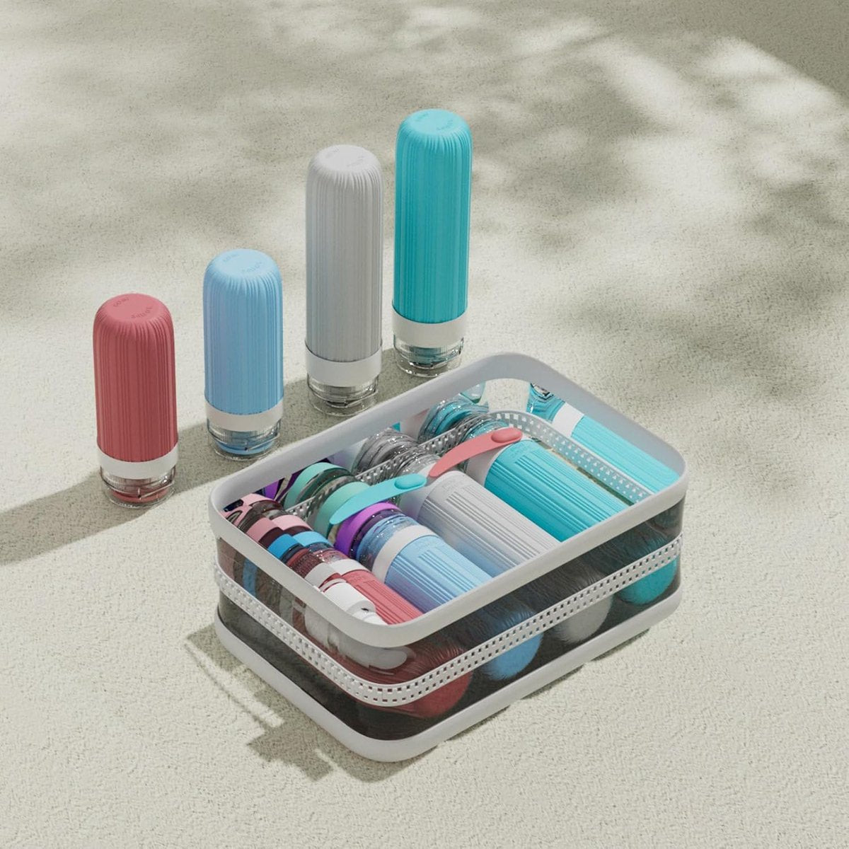 Travel toiletry bottles and accessories packed in the carry case